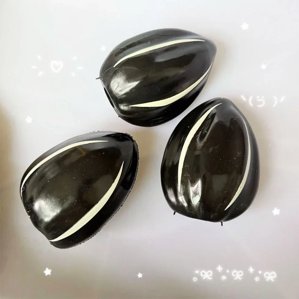 Sunflower Seed Squishy Stress  - огляд і ціна Building Blocks