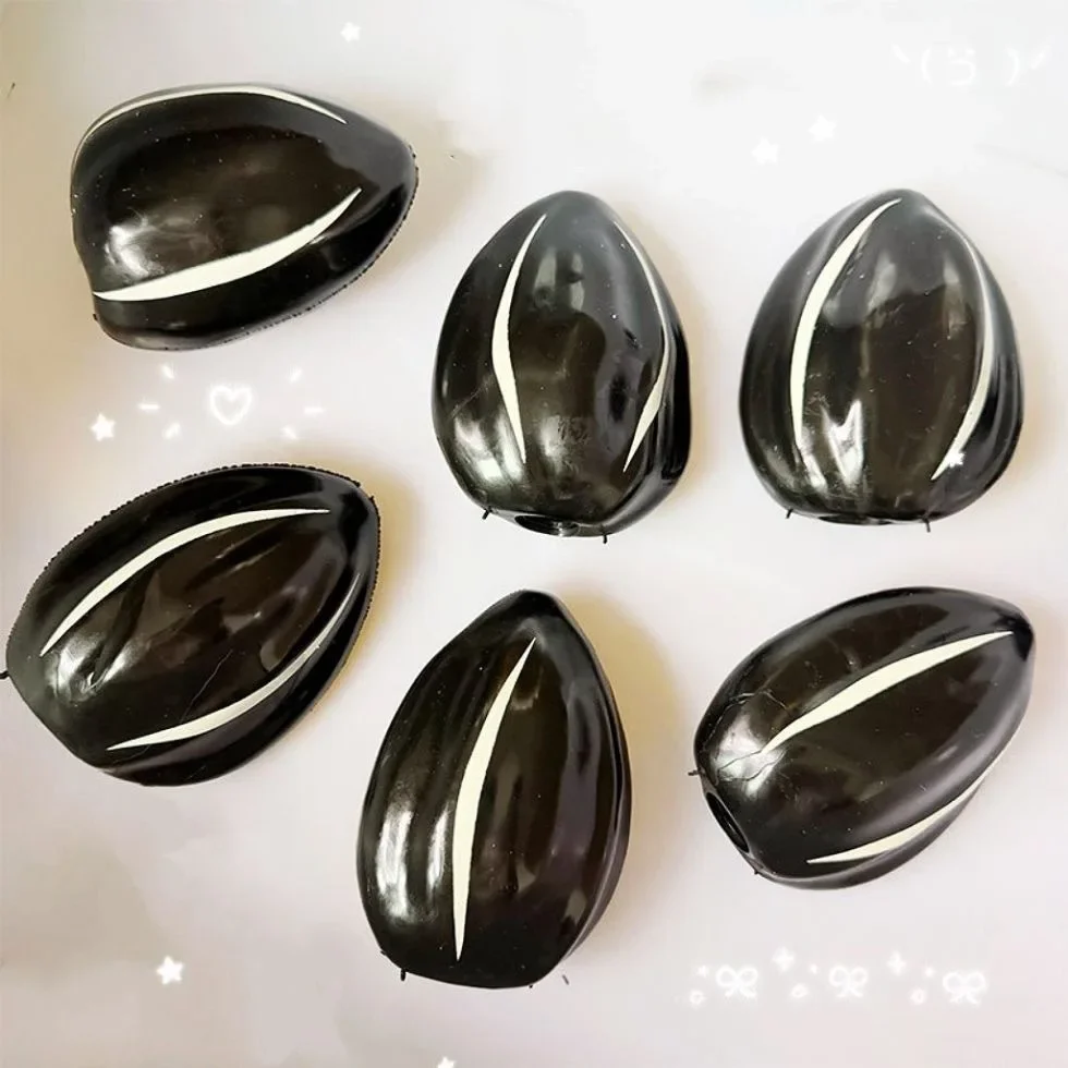 Sunflower Seed Squishy Stress  - огляд і ціна Building Blocks
